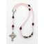 Personalized pink rosary with purple crystals and a name in beads. 