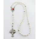 Personalized white pearl wedding rosary with photo centerpiece for a bridal bouquet.