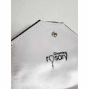 Close up view of snap for a Charming Rosary box. 