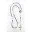 Lavender crystal and white pearl school rosary with photo centerpiece of a nun. 